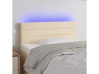 Čelo postele s LED krémové 100x5x78/88 cm textil